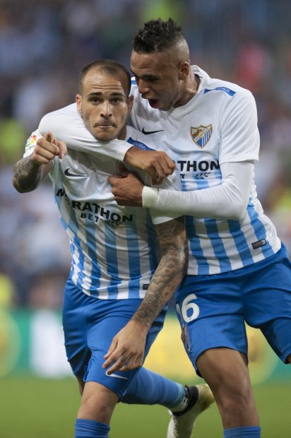 Sandro Ramírez y En-Nesyri celebran un gol con el Málaga. (AFP)